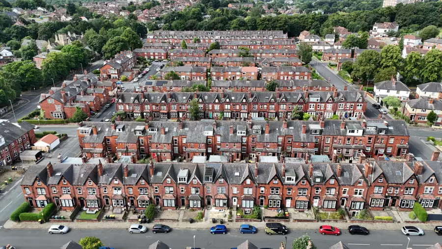 Rows of terraced houses and their roofs, seen from above